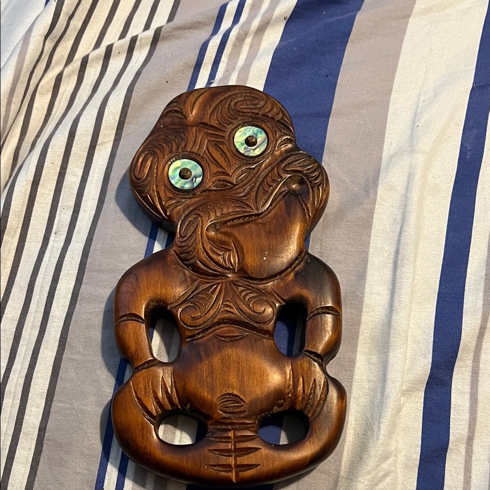 Hand carved Māori tiki wall art